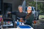 Collapsible Sink pictured with two people using a tailgatengo