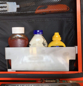 Condiment shelve holding ketchup mayo and mustard